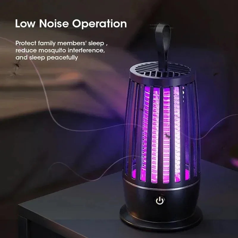 USB rechargeable electric mosquito killer lamp with UV light on a bedside table