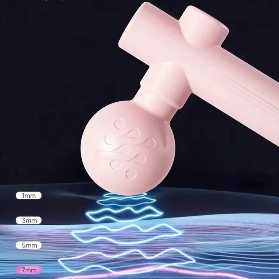 Mini massage gun with interchangeable massage heads