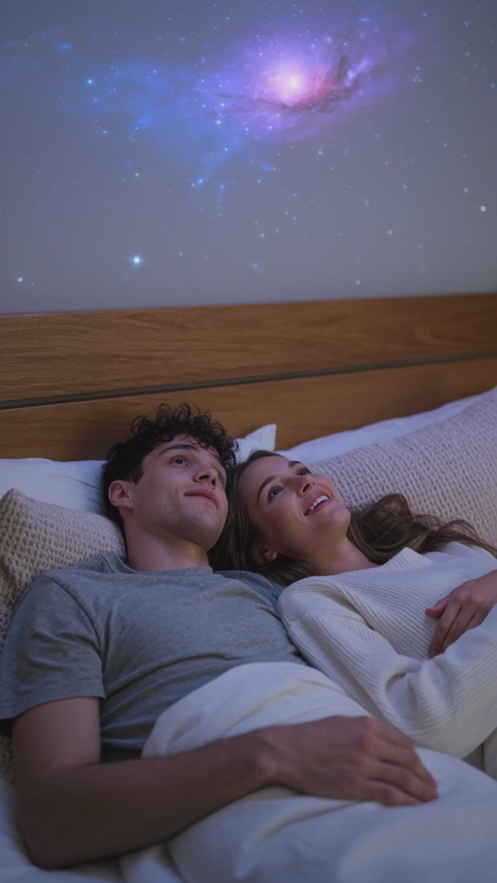 Couple relaxing under the galaxy ceiling